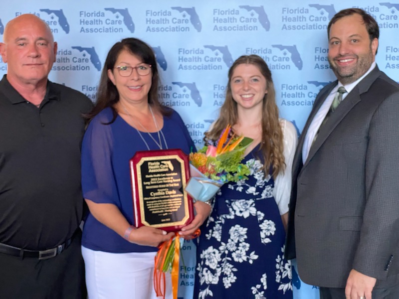 Pictured from left to right: Kevin Davis, Cynthia’s Husband; Cynthia Davis, Registered Nurse Clinical Competency Coordinator; Kayla Armstrong, Administrator-in-Training; and Eric Weisz, Administrator